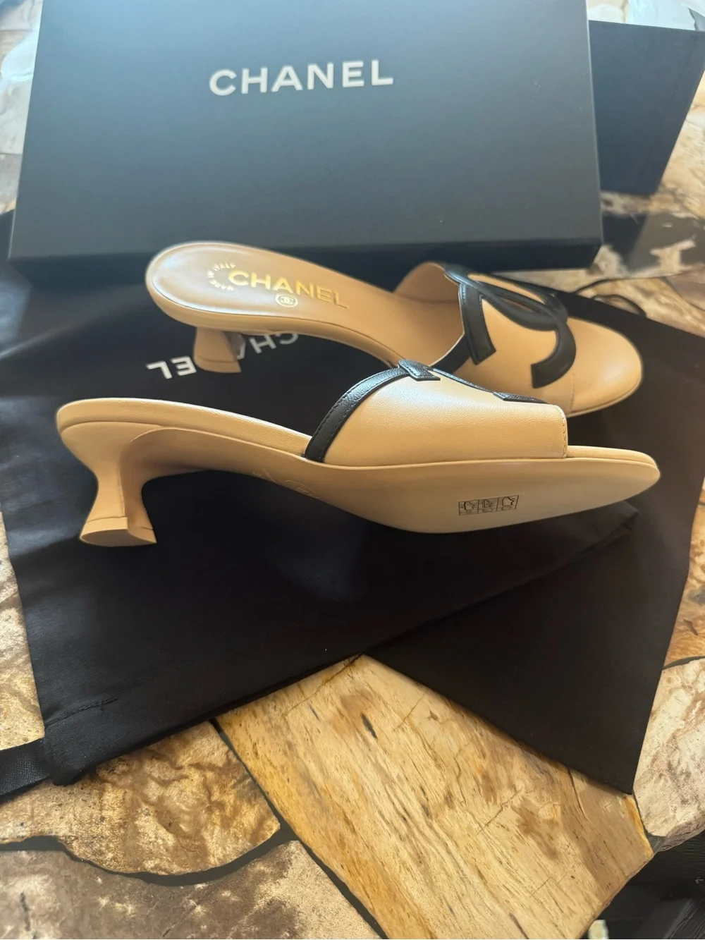 CHANEL Tan and Black Leather CC Slide Mules
